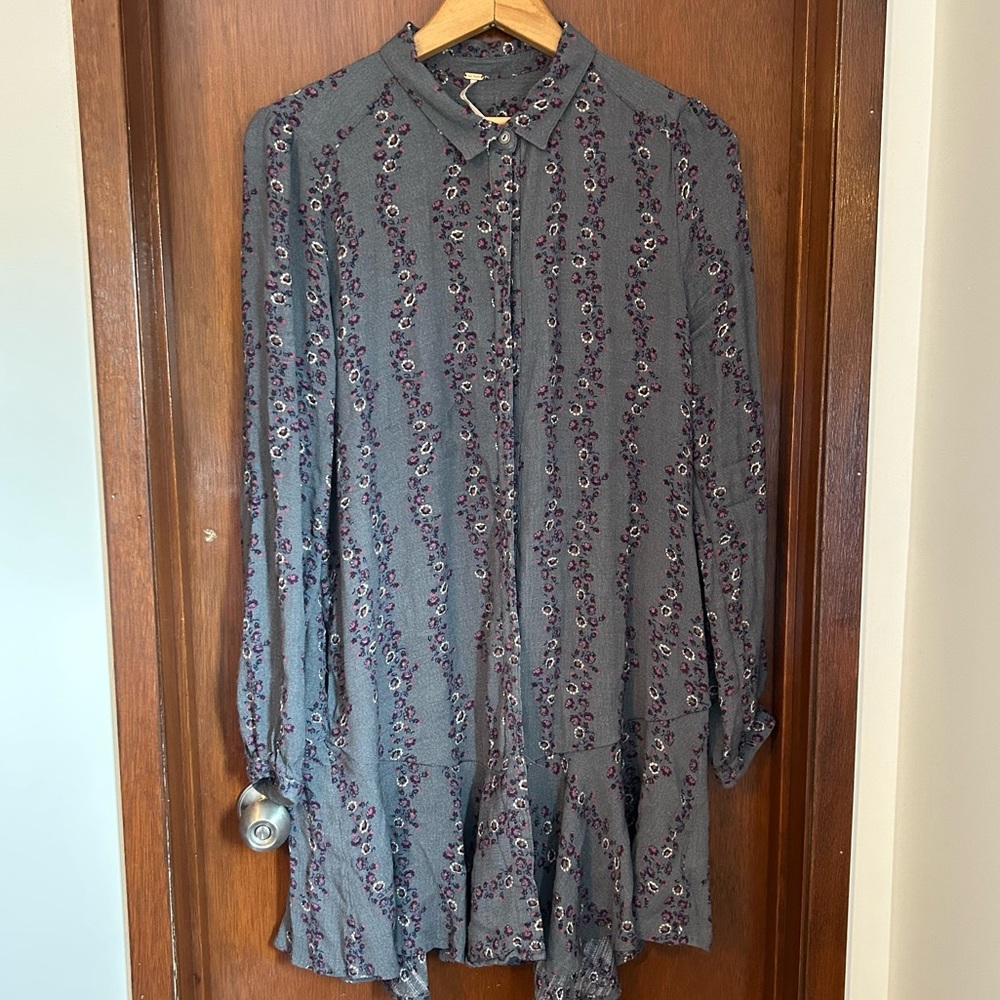 Free People grey shirt dress with ditsy floral design and peplum hem.